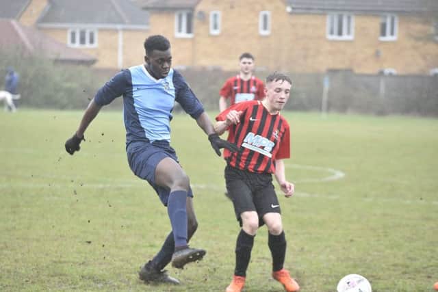 Action from the game between Gunthorpe Harriers Navy Under 18s and Yaxley.