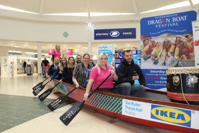 Representatives from the festivals organisers, Gable Events, sponsor IKEA and chosen charity Sue Ryder Thorpe Hall Hospice in the dragon boat at the Serpentine Green shopping centre