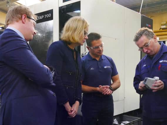 Work and Pensions Secretary Amber Rudd meets staff at Westcombe Engineering in Peterborough.