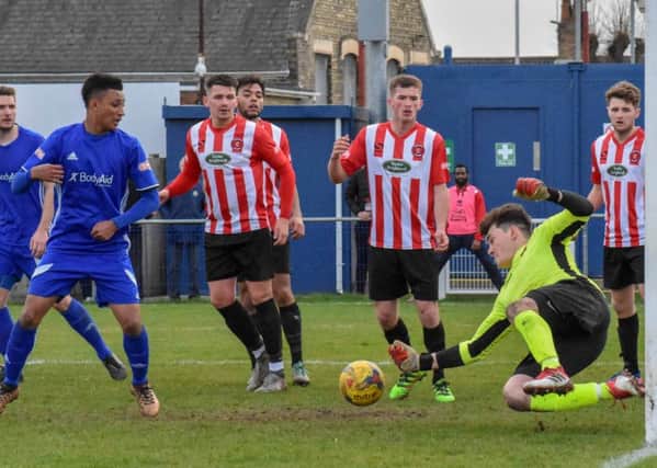 Dion Sembie-Ferris is about to score for Peterborough Sports after a fine save from the Kempston 'keeper. Photo: James Richardson.