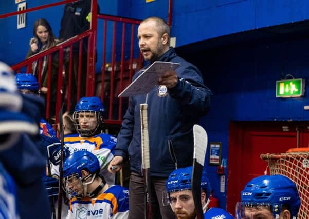 Phantoms coach Slava Koulikov addresses his troops.