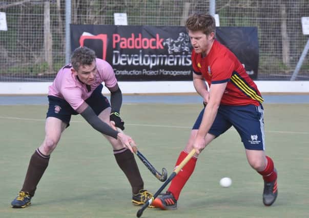 Danny Sisson (red) in action for City of Peterborough against Teddington. Photo: David Lowndes.