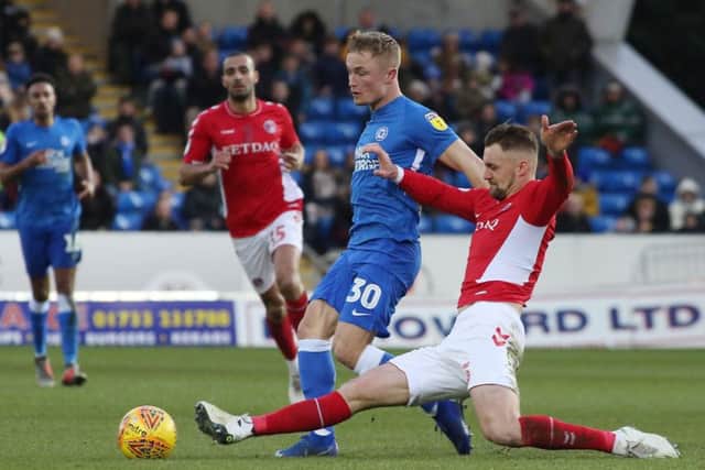 Posh midfielder Kyle Dempsey is in the running for a starting place against AFC Wimbledon.