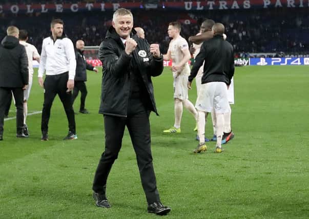 Ole Gunnar Solskjaer celebrates Manchester United's famous win in Paris.