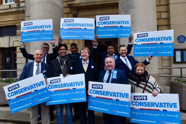 Conservative Party candidates and supporters outside the Town Hall