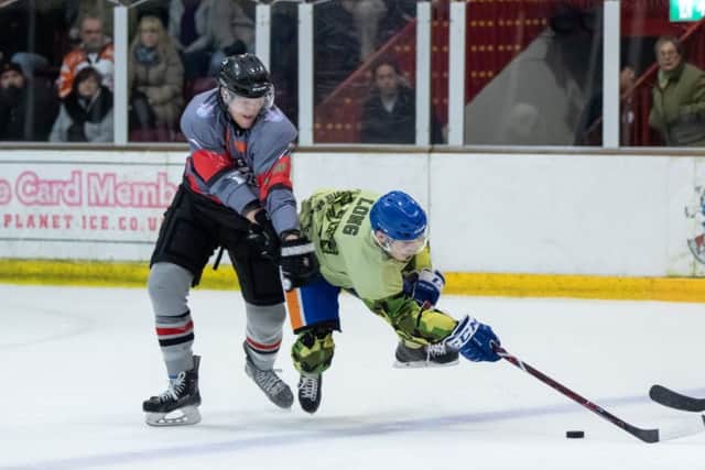 Phantoms Nathan Long is felled by Bison's Adam Jones. Picture: Tom Scott