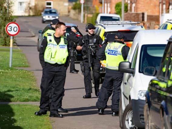 Armed police in Wisbech this afternoon. Photo: Terry Harris