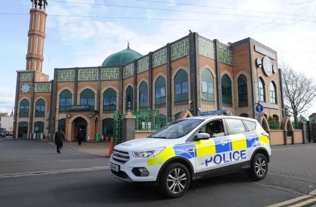 Police car around the Faizan-e-Madinah mosque following attack in New Zealand EMN-190315-141923009
