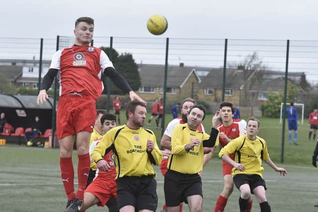 Action from Netherton Reserves (yellow) against Spalding Athletic at the Grange. Photo: David Lowndes.