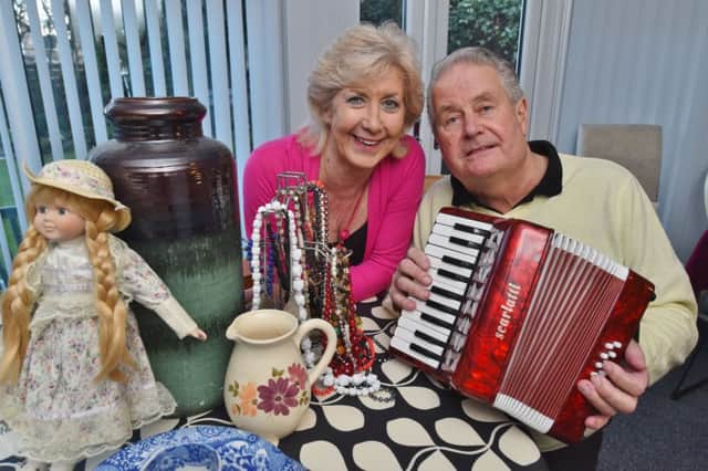 John and Rosie Sandall with items for their latest Chernobyl sale. EMN-190316-170529009