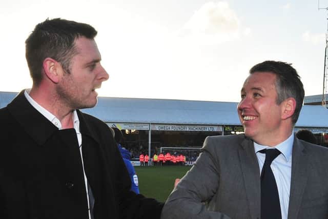 Posh chairman Darragh MacAnthony (left) and manager Darren Ferguson in 2014.