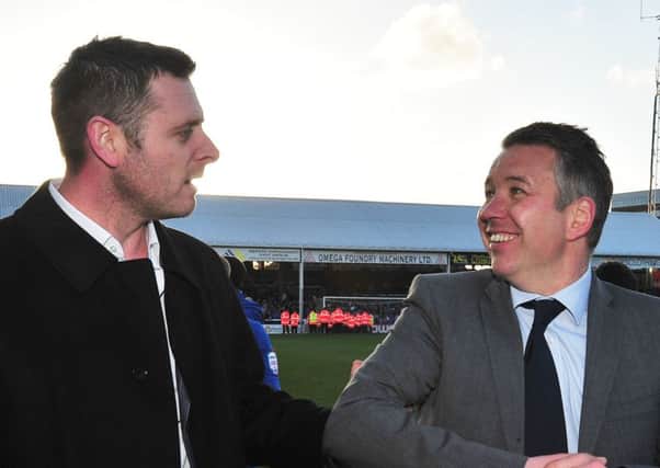 Posh chairman Darragh MacAnthony (left) and manager Darren Ferguson in 2014.