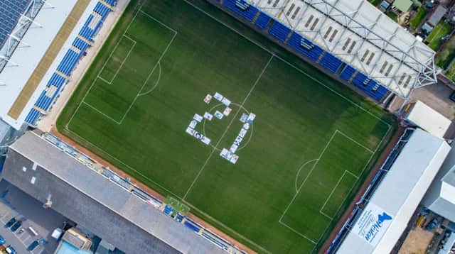 21 Made up from large photographs of people with Down's Syndrome to mark World Down Syndrome Day 2019,
Abax Stadium, Peterborough
Wednesday 20 March 2019. 
Picture by Terry Harris. THA
