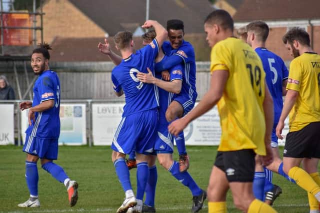 Peterborough Sports players celebrate Stuart Wall's goal against Barton Rovers. Photo: James Richardson.