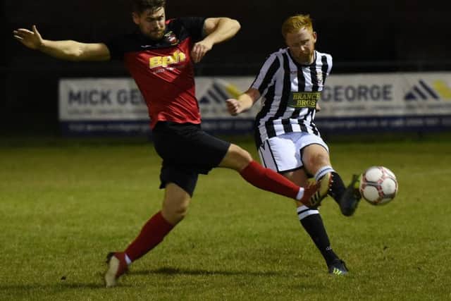 Jack Bloodworth (stripes) scored for Peterborough Northern Star at ON Chenecks.
