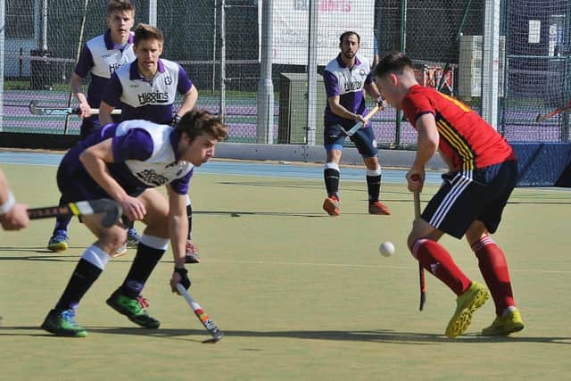 Action from City of Peterborough (red) v Old Loughtonians. Photo: David Lowndes.