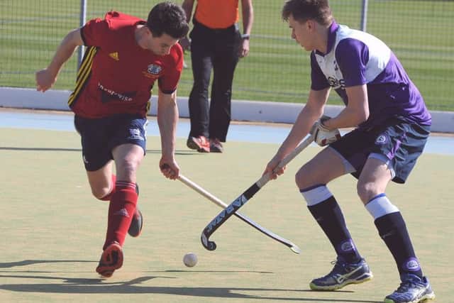 Action from City of Peterborough (red) v Old Loughtonians. Photo: David Lowndes.