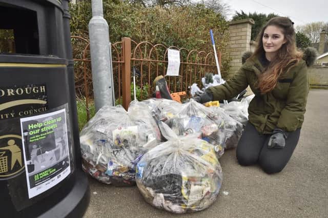 Victoria Morland with the rubbish she collected
