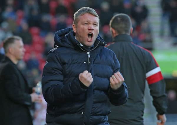 Doncaster's former Posh boss Grant McCann has led his current team back above his old team.