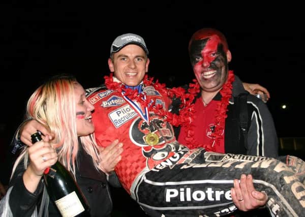 Hans Andersen celebrates the Elite League title success in 2006 with Panthers fans.
