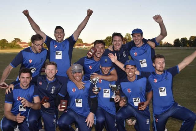 Bourne CC celebrate their 2018 Jaidka Cup Final win over Ramsey.