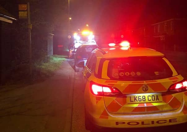 Police stopping the car on the A605. Photo: Cambridgeshire police