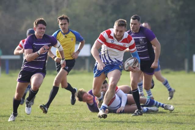 Tom Gulland on his way to the try-line for Peterborough Lions. Picture: Mick Sutterby