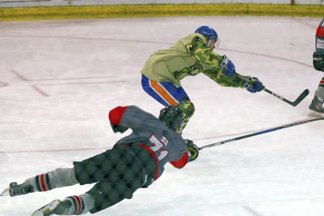Nathan Pollard of Phantoms is denied by a full-length diving tackle by a Basingstoke defender. Photo:  Paul Young, Nene Digital.