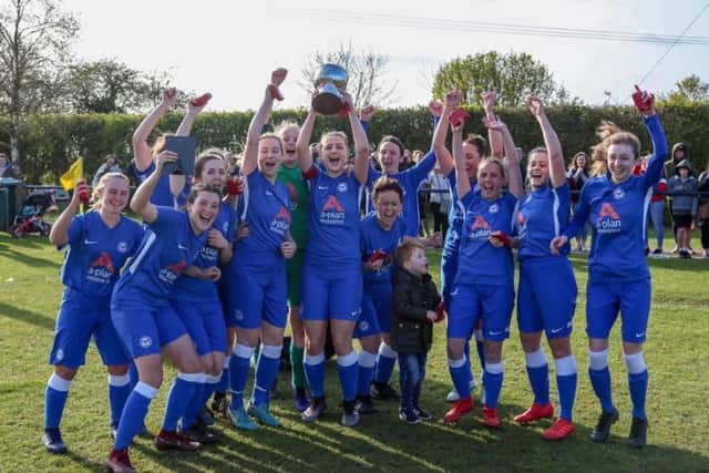 Posh Ladies celebrate their county cup triumph. Picture: Joe Dent