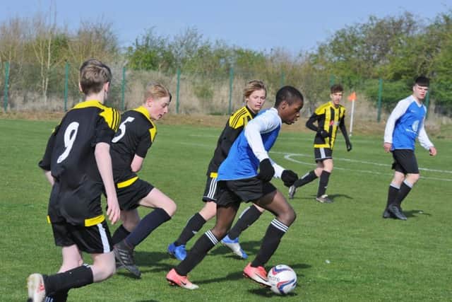 Action from the game between Whittlesey Blue Under 15s and Crowland.