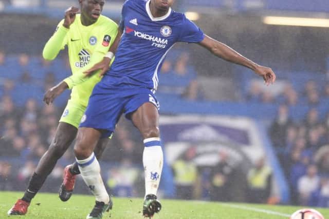 Leo Da Silva Lopes (left) in action for Posh against Chelsea.