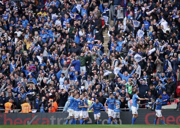 Portsmouth fans celebrate a goal in the Checkatrade Trophy FInal at Wembley.