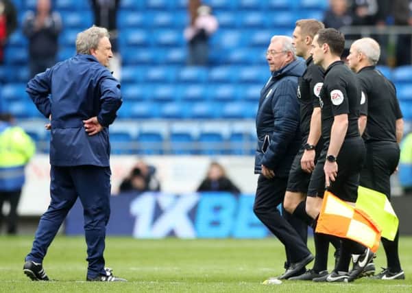 Cardiff City manager Neil Warnock and some dozy officials.