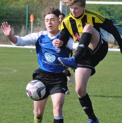 Action from the game between Whittlesey Blue Under 15s and  Crowland.