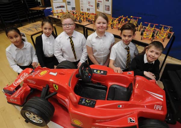 Pupils from Werrington primary school with their STEM project work.  EMN-190329-173228009