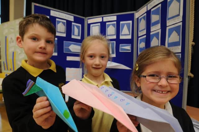 Pupils from Werrington primary school with their STEM project work.   EMN-190329-173251009