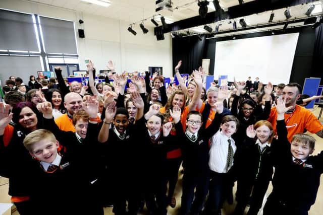 The fulfilment centre in Peterborough made a £1,000 donation to help fund new science equipment for Nene Park Academy.