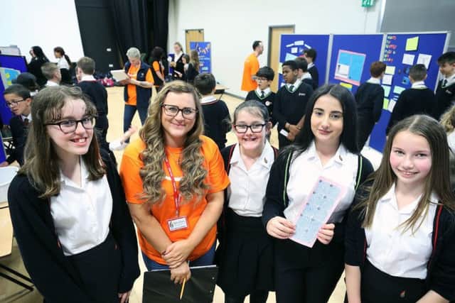 The fulfilment centre in Peterborough made a £1,000 donation to help fund new science equipment for Nene Park Academy.