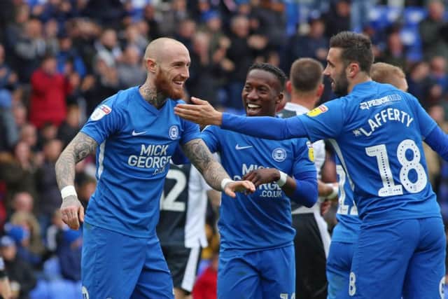 Marcus Maddison is delighted after scoring for Posh against Gillingham.  Photo: Joe Dent/theposh.com.