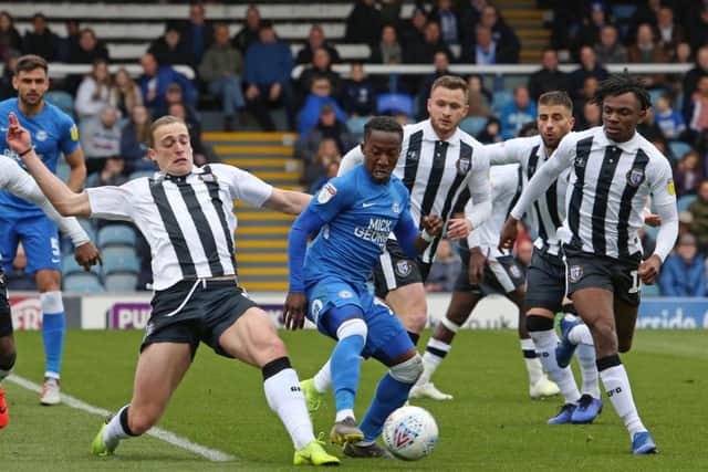 Siriki Dembele of Peterborough United in action against Gillingham. Photo: Joe Dent/theposh.com.