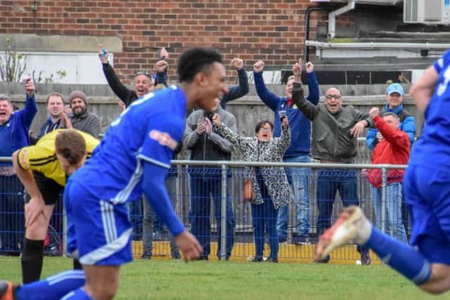 Peterborough Sports celebrate a goal against Sutton Coldfield sending their fans wild! Photo: James Richardson.
