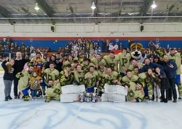Peterborough Phantoms players and officials with their three trophies. Photo: ©2018 Tom Scott. All rights reserved.