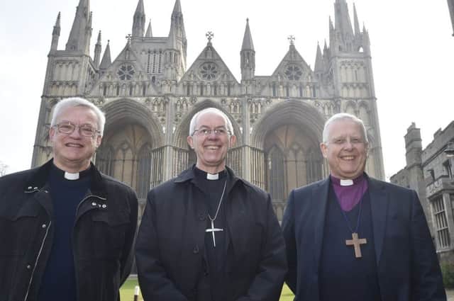Archbishop of Cantebury Justin Welby visiting Peterborough with Bishop of Peterborough  Rt Revd. Donald Allister, The Vicar of Peterborough Revd Canon Ian Black and Harry Traynor, assistant centre manager , during a tiour of Queensgate Queensgate EMN-190804-115157009