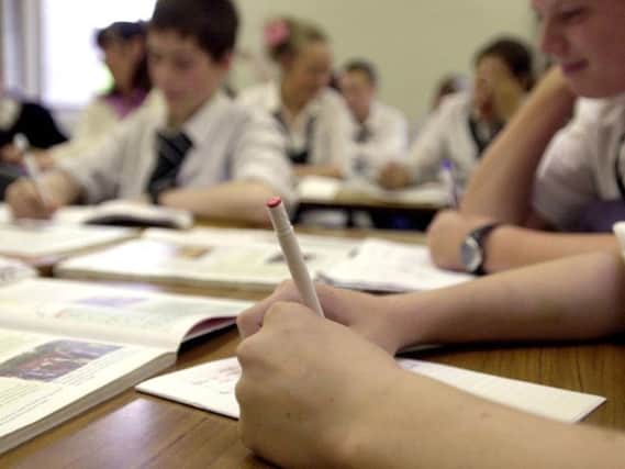 A stock image of school pupils taking exams