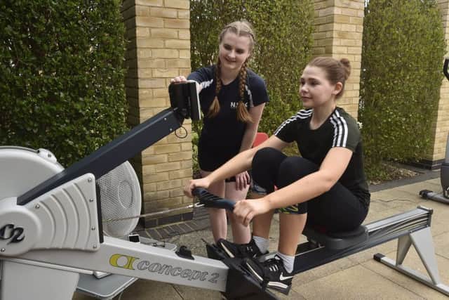 Georgina Parker and Hannah Bassett doing their sponsored row