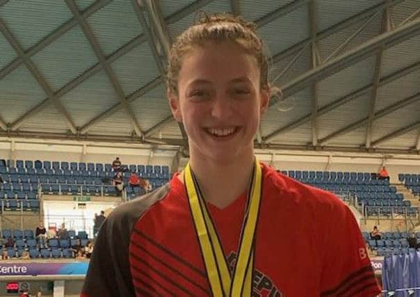 Beth Eagle-Brown swam a new club record and won two bronze medals.