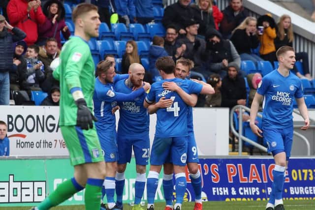 Posh players celebrate Matt Godden's goal against Gillingham. Photo: Joe Dent/theposh.com.
