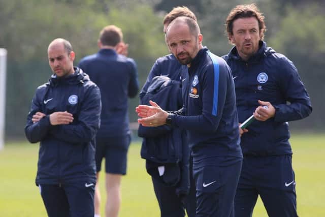 Posh youth team coach Simon 'Digger' Davies (right). Photo: Joe Dent/theposh.com.