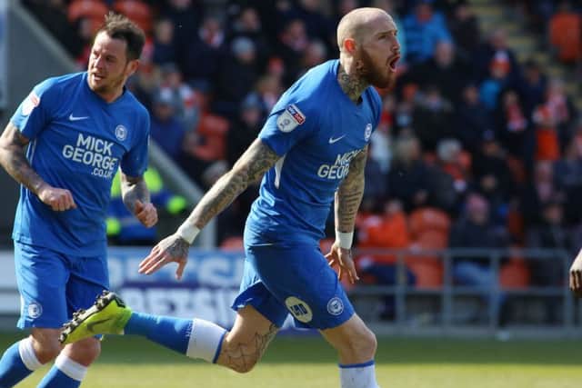 Posh star Marcus Maddison celebrates the only goal of the game at Doncaster. Photo: Joe Dent/theposh.com.