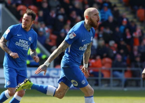 Posh star Marcus Maddison celebrates the only goal of the game at Doncaster. Photo: Joe Dent/theposh.com.